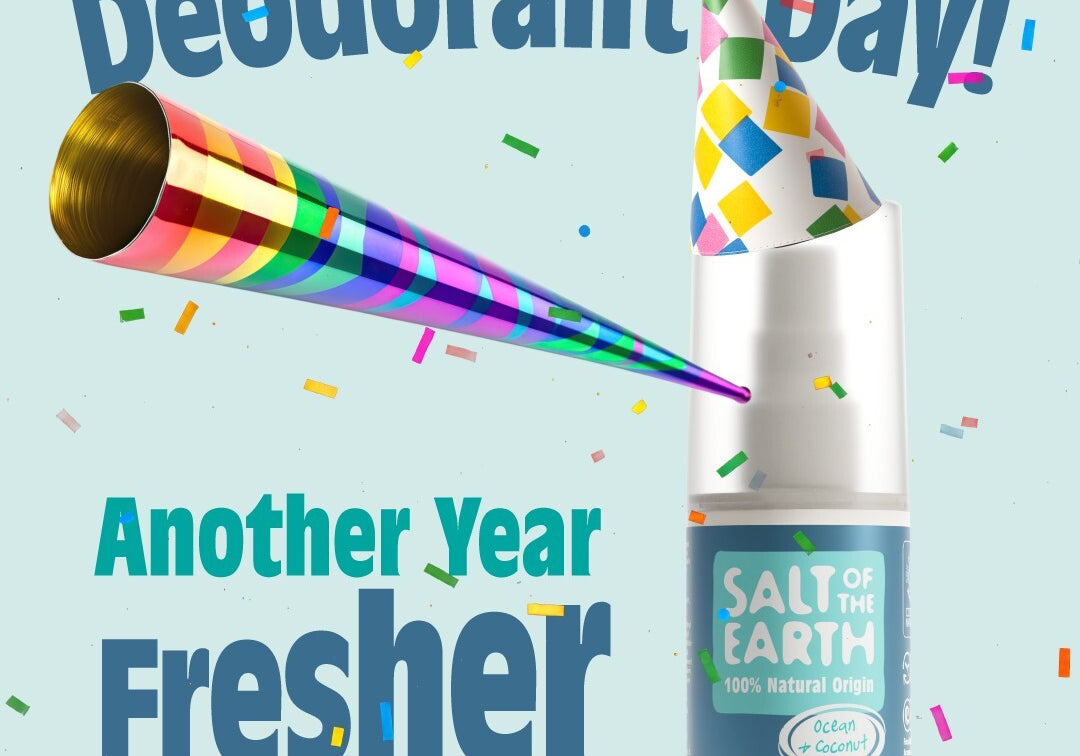 Salt of the Earth Ocean & Coconut refillable spray deodorant wearing a party hat with confetti and party blower, celebrating National Deodorant Day with the text ‘Happy National Deodorant Day! Another Year Fresher